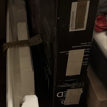DC Renovations Handyman - Styrofoam protecting TV from the box. - Flooring Near Me