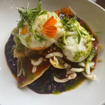 XICA - Chilaquiles w/poached eggs- 1/2 reds& green sauce - Mexican Near Me - San Francisco, California