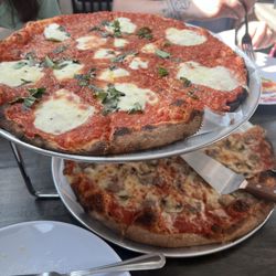 The Beacon Pizza Bar - Margarita pizza on top and sausage and mushrooms on the bottom.