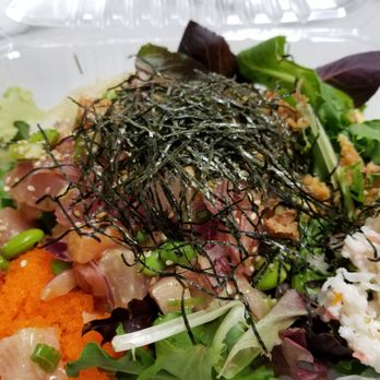 Poke Rainbow - I ordered all the toppings so lots of seaweed on top. 4 different fish in there but it's hard to tell. Was yummy! - Poke Near Me - Van Nuys, California