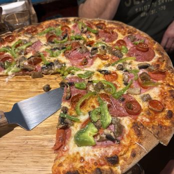 Smoking Monkey Pizza - Combination Pizza...bell peppers, pepperoni, sausage, salami, mushrooms & ham. - Pizza Near Me - Renton, Washington Smoking Monkey Pizza - Combination Pizza...bell peppers, pepperoni, sausage, salami, mushrooms & ham. - Pizza Near Me - Renton, Washington