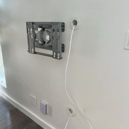 Installed Unifi wifi 6 in wall access point and a cable channel for the tv