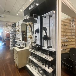 Anew Kitchen and Bath - Shower displays featuring Riobel, California Faucets, Rubinet Faucet Company, Samuel Heath, and more.