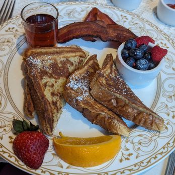 The Inn at Erlowest - French toast (dry, lacking in flavor, strawberry garnish was dried up) - Hotels Near Me - Lake George, New York The Inn at Erlowest - French toast (dry, lacking in flavor, strawberry garnish was dried up) - Hotels Near Me - Lake George, New York