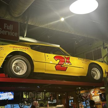 Quaker Steak & Lube - a yellow car on display - Steakhouses Near Me - Council Bluffs, Iowa Quaker Steak & Lube - a yellow car on display - Steakhouses Near Me - Council Bluffs, Iowa