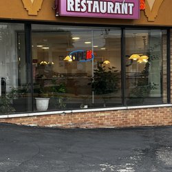 Mother’s Day Restaurant - The bay window at the front entryway to the Restaurant as well as the parking lot.