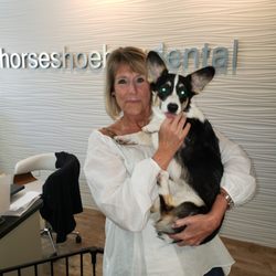 Horseshoe Bay Dental - Another happy patient holding the whoop!