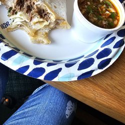 Birria burrito with a side of consome so delicious