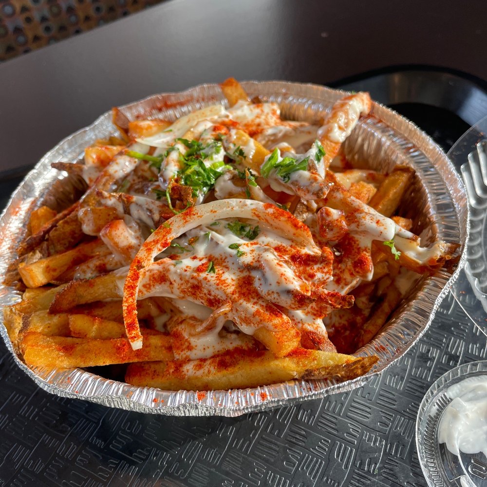Pita BBQ - Spicy garlic fries - Mediterranean Near Me - South Elgin, Illinois Pita BBQ - Spicy garlic fries - Mediterranean Near Me - South Elgin, Illinois