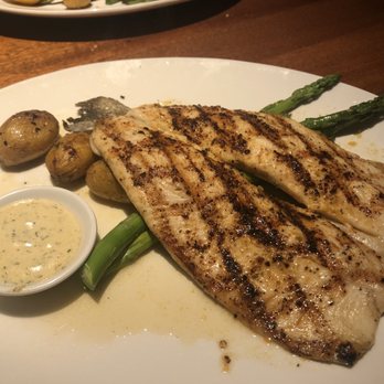 Seasons 52 - Wood Grilled Boneless Trout with mustard dill sauce. - New American Near Me - Houston, Texas