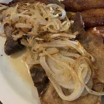 El Cubano - The pork chops with onions and garlic sauce, with plantains, black beans and rice - Cuban Near Me - Valencia, California