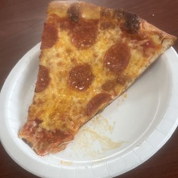 Nino's Pizza & Restaurant - Slice of pepperoni pizza - Pizza Near Me - Orlando, Florida Nino's Pizza & Restaurant - Slice of pepperoni pizza - Pizza Near Me - Orlando, Florida