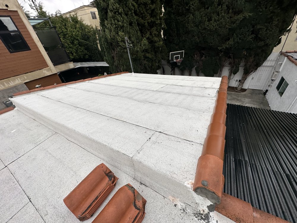 Slide of 3G Tres Generaciones Roofing