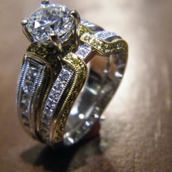 Touch of Silver Gold & Old - A magnificent yellow and white gold wedding set.