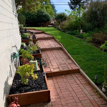 Oakland Hills Landscape - a brick walkway with raised planters - Fences & Gates Near Me Oakland Hills Landscape - a brick walkway with raised planters - Fences & Gates Near Me