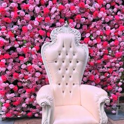 Peak Party Rentals - Pink Flower wall and thrown chair