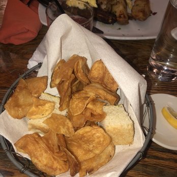 Sal Y Pimienta Kitchen - Plantain chips/starter bread - Latin American Near Me - Houston, Texas