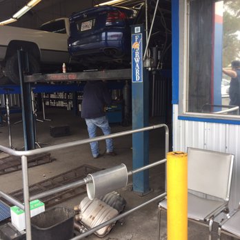 Muffler Tech - Finally up on the lift getting the exhaust cut out. - Auto Repair Near Me - Sacramento, California Muffler Tech - Finally up on the lift getting the exhaust cut out. - Auto Repair Near Me - Sacramento, California