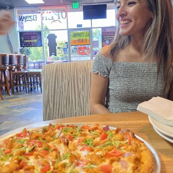 BWP - Pizza Island - Tikki pizza with one happy customer. - Pizza Near Me - Murrieta, California BWP - Pizza Island - Tikki pizza with one happy customer. - Pizza Near Me - Murrieta, California