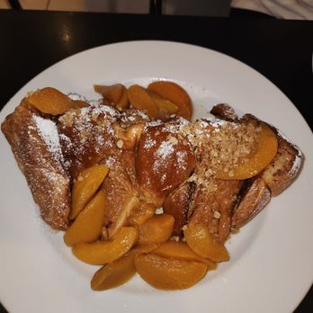 Big John's Eatery - Peach cobbler French toast. If the peaches were cooked in a juice or syrup these would have been perfect. Still very delicious - Breakfast & Brunch Near Me - West Palm Beach, Florida Big John's Eatery - Peach cobbler French toast. If the peaches were cooked in a juice or syrup these would have been perfect. Still very delicious - Breakfast & Brunch Near Me - West Palm Beach, Florida
