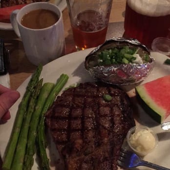 Back Alley - 12oz Porterhouse medium rare with baked potato it was perfect - Bowling Near Me - Bishop, California