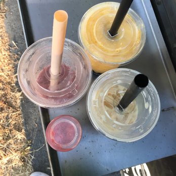 Creative SIPS - a table with a variety of drinks - Bubble Tea Near Me