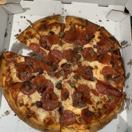 Large Meat Eater Pizza.  Is this the standard slicing?  I find the slicing odd and inconsistent with my previous order.
