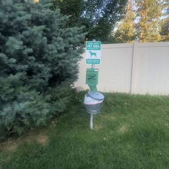 Canyon Bluffs Apartments - Courtesy dog poop trash bags and trash can - Apartments Near Me - Spokane, Washington