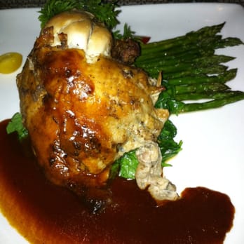 Andrei's Restaurant - Roasted Chicken in natural jus. Spinach and asparagus with olive oil/garlic. - New American Near Me - Irvine, California
