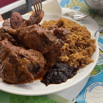Palace Gate Restaurant - Rice and chicken (Jollof Rice) - African Near Me - Chicago, Illinois