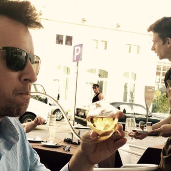 Ti Camila - My white port in this cool glass pipe and Jorge in the background. - Bars Near Me - Lisbon, 11