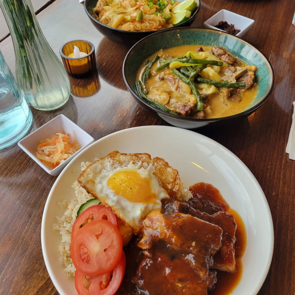 Karenderya - Top to bottom: pancit (chicken), kare kare, adobe pork belly rice bowl w fried egg - Filipino Near Me - Nyack, New York Karenderya - Top to bottom: pancit (chicken), kare kare, adobe pork belly rice bowl w fried egg - Filipino Near Me - Nyack, New York