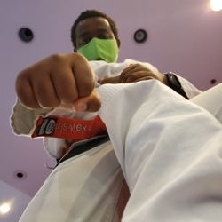 KATMA - Kombative Academy of Traditional Martial Arts - Student demonstrates a take down and finishing punch.