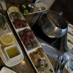 The Melting Pot - The lighting wasn't great but the filet mignonette and lobster were!!