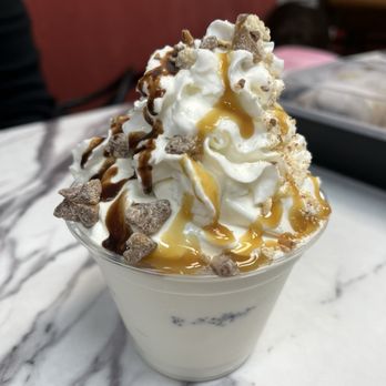 Moe's Pastrami & Burger - Sundae with chocolate and caramel sauces and Twix bits - Burgers Near Me - Brooklyn, New York Moe's Pastrami & Burger - Sundae with chocolate and caramel sauces and Twix bits - Burgers Near Me - Brooklyn, New York
