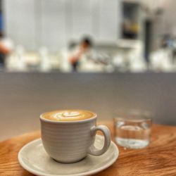Industry Beans - A very white decor even down to the coffee grinders, and steamers.