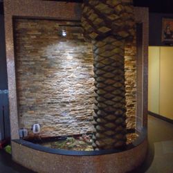 Osaka Sushi Bar and Hibachi - An awesome pond and water feature by the back kitchen entrance.