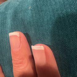 Pearl Nail & Spa - Uneven polish and nail edges are rough.