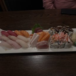 Take (10 sashimi, 10 nigiri, and a spicy trio roll) - serves two Take (10 sashimi, 10 nigiri, and a spicy trio roll) - serves two