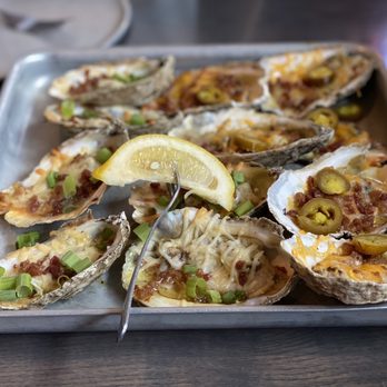 Shuckin' Shack Oyster Bar - Chargrilled Oysters (Jalpeno Cheddar and Parmesan Garlic, both topped with Bacon) super tasty but small. - Seafood Near Me - Cumming, Georgia Shuckin' Shack Oyster Bar - Chargrilled Oysters (Jalpeno Cheddar and Parmesan Garlic, both topped with Bacon) super tasty but small. - Seafood Near Me - Cumming, Georgia