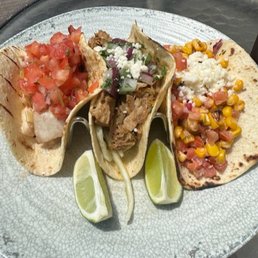 Street tacos L-R
Grilled Catch of the Day, Braised Pork, and Roasted Corn Street tacos L-R
Grilled Catch of the Day, Braised Pork, and Roasted Corn