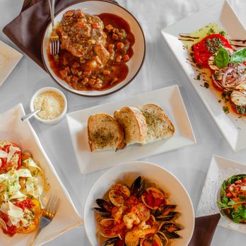 Sal De Forte’s  - Arrangement of Ossobuco, Zuppa De Mare, Ceviche, Jersey Tomato Salad, Stuffed Peppers, NY Cheesecake & Fresh Seasoned Bread - Italian Near Me - Ewing Township, New Jersey