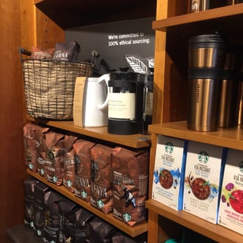 Starbucks - a shelf of coffee and coffee bags - Coffee & Tea Near Me - North Vancouver, British Columbia Starbucks - a shelf of coffee and coffee bags - Coffee & Tea Near Me - North Vancouver, British Columbia