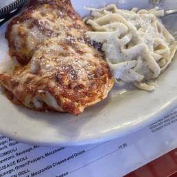 our meal came with salads, delicious bread . We had Manicotti, Tour of Italy, and Spaghetti our meal came with salads, delicious bread . We had Manicotti, Tour of Italy, and Spaghetti