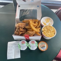 Krispy Krunchy Chicken - My four piece Krispy Krunch dinner with big potato wedges, and 1/2 Jambalaya & 1/2 Mac and Cheese.