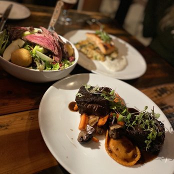 Henley's Village Tavern - WARM GOAT CHEESE SALAD BRAISED BONELESS SHORT RIBS GRILLED & ROASTED ATLANTIC SALMON - Gastropubs Near Me - Brightwaters, New York