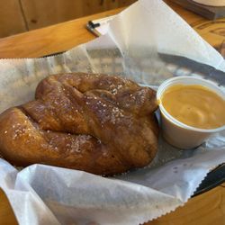 Mio Saloon - Large pretzel with beer cheese.