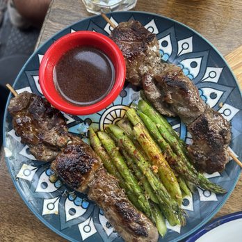 Pil Pil - Beef skewers with asparagus - Tapas Bars Near Me - New York, New York Pil Pil - Beef skewers with asparagus - Tapas Bars Near Me - New York, New York