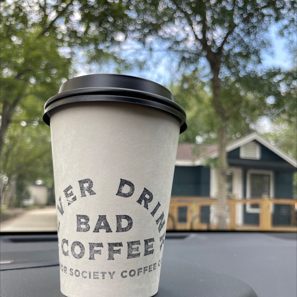 Honor Society - a cup of coffee on the dashboard of a car - Coffee Roasteries Near Me - Tomball, Texas Honor Society - a cup of coffee on the dashboard of a car - Coffee Roasteries Near Me - Tomball, Texas