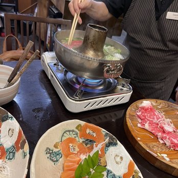 Yoshitsune Restaurant - Mamasan cooking the shabu shabu for us - so yummy! - Japanese Near Me - Honolulu, Hawaii Yoshitsune Restaurant - Mamasan cooking the shabu shabu for us - so yummy! - Japanese Near Me - Honolulu, Hawaii